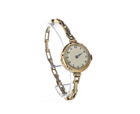 LADY'S NINE CARAT GOLD MANUAL WIND WRIST WATCH, the round cream dial with Arabic hour markers, 25mm case, on an expanding bra