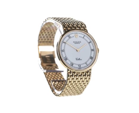 GENTLEMAN'S ROLEX CELLINI EIGHTEEN CARAT GOLD MANUAL WIND WRIST WATCH, the round white dial with Roman and dot hour markers, 