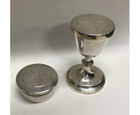 A cased silver Communion Cup and box. London 1909. By A R Mowbray &amp; Co Ltd. Approx. 140 grams. Est. £200 - £300.