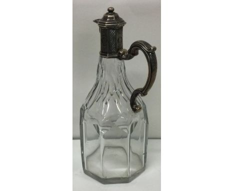 PAUL DE LAMERIE STYLE: An early 18th Century silver mounted liqueur bottle.&nbsp;Approx. 800 grams gross weight. Est. £600 - 