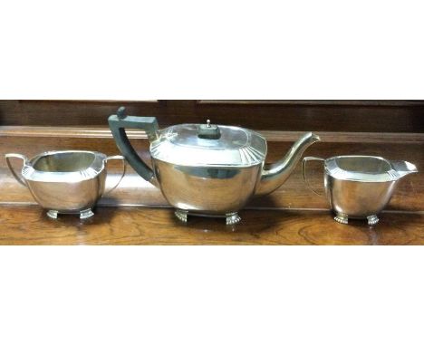 A heavy silver three piece tea service. Birmingham. By WA. Approx. 932 grams. Est. £200 - £300.