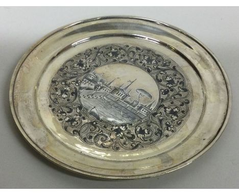 A circular Russian silver and Niello tray / Kiddush cup stand. Dated 1883. Approx. 132 grams. Est. £200 - £300.