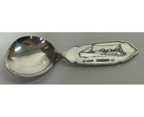 OF SHIPPING INTEREST: An unusual silver caddy spoon. Approx. 33 grams. Est. £60 - £80.