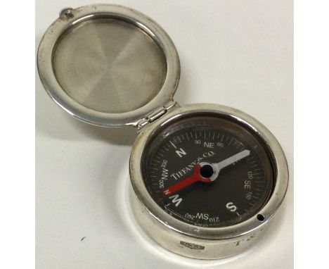 TIFFANY &amp; CO: A rare silver compass with hinged lid. Approx. 35 grams. Est. £80 - £120.