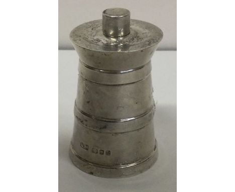 A novelty silver pepper grinder. London 1969. By PC Ltd. Approx. 117 grams. Est. £100 - £150.