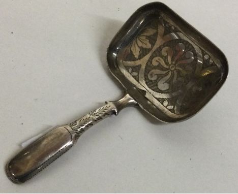 An 18th Century George III silver caddy spoon with bright cut decoration. Birmingham 1792. By John Taylor. Approx. 7 grams. E