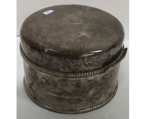 A good circular silver tea caddy. London. Approx. 474 grams. Est. £150 - £200.