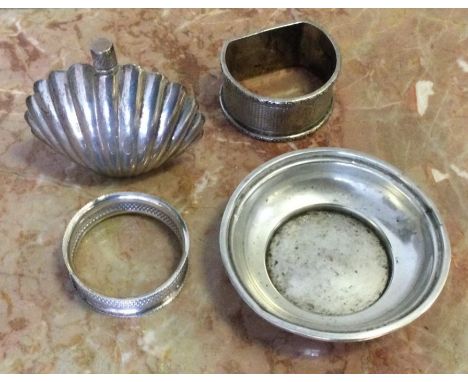 A silver pin dish napkin ring etc. Approx. 59 grams. Est. £20 - £30.