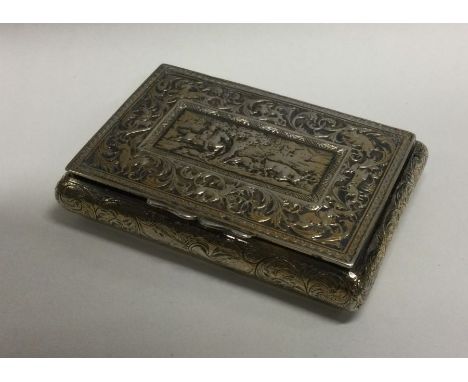 A Victorian silver snuff box embossed with horse scene to centre. Approx. 82 grams. Est. £100 - £150.