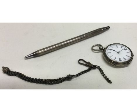 A silver fob watch together with a pencil. Approx. 66 grams. Est £20 - £30.