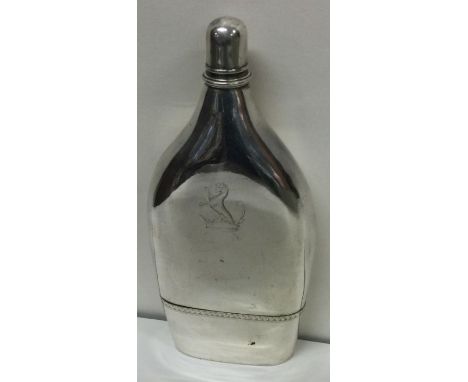 An early Georgian 18th Century silver flask with detachable cup. London 1777. Approx. 208 grams. Est. £600 - £800.