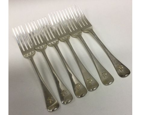 A set of six OE pattern silver dissert forks. London. By HH. Approx. 244 grams. Est. £100 - £150.