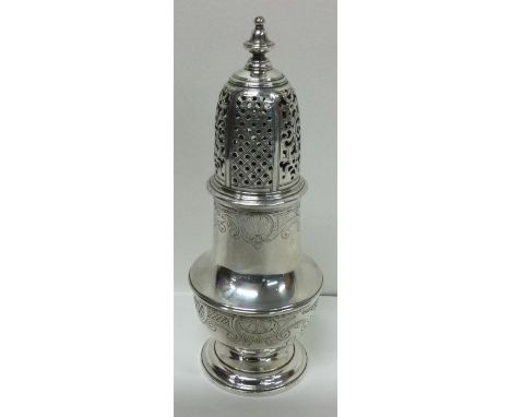 A George II silver sugar caster of Rococo design. London 1743. Approx. 164 grams. Est. £300 - £500.