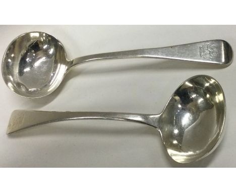 A pair of Georgian silver sauce ladles. London. By CC. Approx.105 grams. Est. £40 - £60.