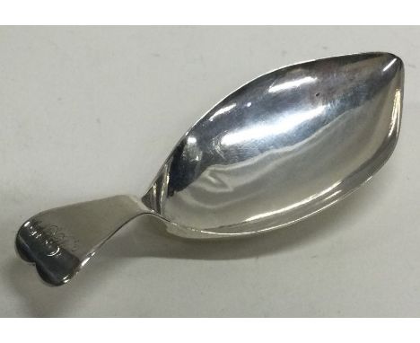 A Georgian silver caddy spoon. Birmingham. By WP. Approx. 9 grams. Est £30 - £40.