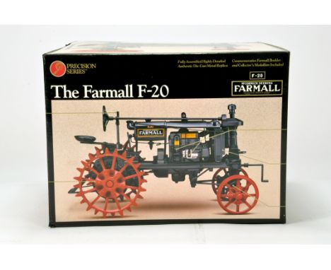 Ertl 1/16 Farm Diecast model comprising Precision Series Farmall F-20 Tractor on steel wheels. NM to M in Box.