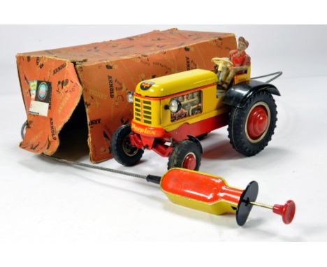 Arnold (Germany) No. 445 Tin Plate Spring Driven Tractor. Untested and some visible wear but still displays well and a scarce