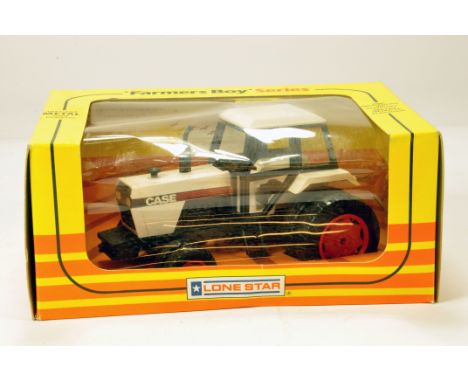 Lone Star 1/30 Farmers Boy Case 1594 Tractor with Dual Wheels. NM to M in Box.