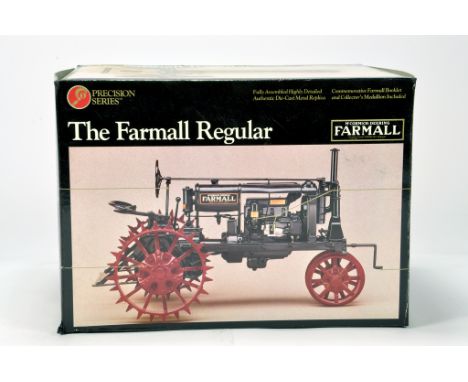 Ertl 1/16 Farm Diecast model comprising Precision Series Farmall Regular Tractor on steel wheels. NM to M in Box.