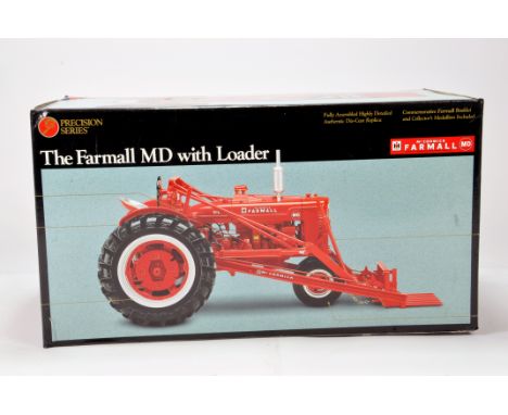 Ertl 1/16 Farm Diecast model comprising Precision Series Farmall MD Tractor with Loader. NM to M in Box.