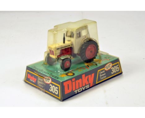 Dinky No. 305 David Brown 995 Tractor. Issue with brown hitch. Generally E to NM in VG Bubble Packaging. 