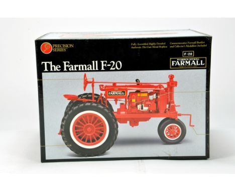 Ertl 1/16 Farm Diecast model comprising Precision Series Farmall F-20 Tractor on rubber wheels. NM to M in Box.