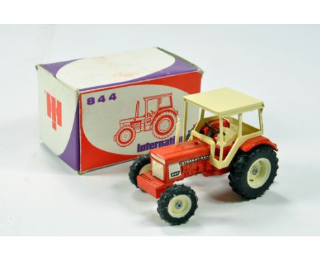 Diano 1/43 Farm Diecast Model comprising International 844 Tractor. E to NM in Box. Rare.