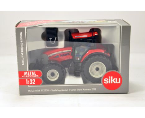 Siku 1/32 Diecast Farm Model comprising McCormick TTX230 Spalding Show Tractor for 2011. NM to M in Box.