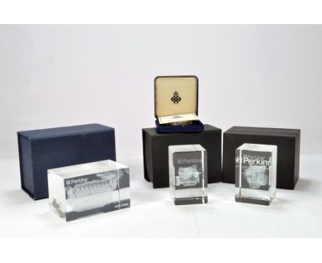 Interesting group of glass etched Perkins Engine Commemorative weights each with a different engine inprinted.