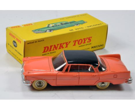 French Dinky No. 545 De Soto Diplomat with light coral body and black roof. Superb example is NM in E Box.