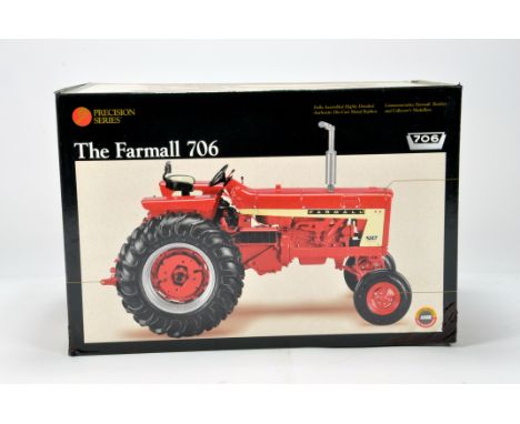 Ertl 1/16 Farm Diecast model comprising Precision Series Farmall 706 Tractor. NM to M in Box.