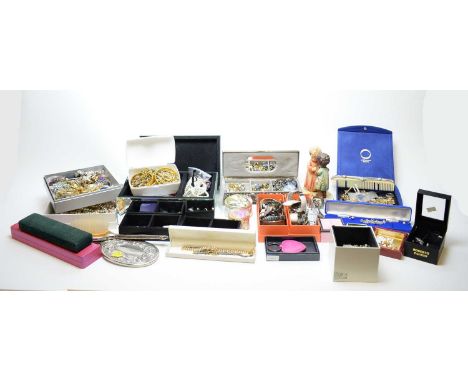 A quantity of costume jewellery; a Goebel Hummel Unicef figurine, limited edition, 1851/25000; and various other items.