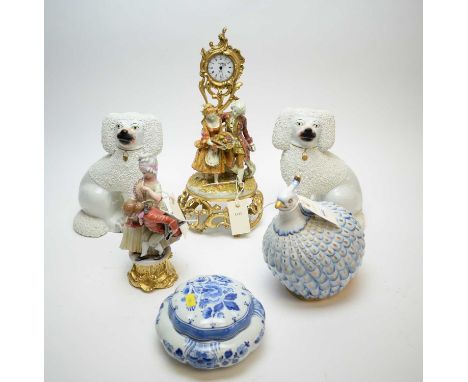 Pair of Staffordshire dogs, 24cm high; Capodimonte figural group of a courting couple; Capodimonte bird; and a Swiza gilt man