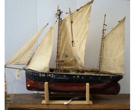 A scratch-built ship's model 'Halcyone', with two masts at full sail, 93cms long overall, on stand and in travel case.