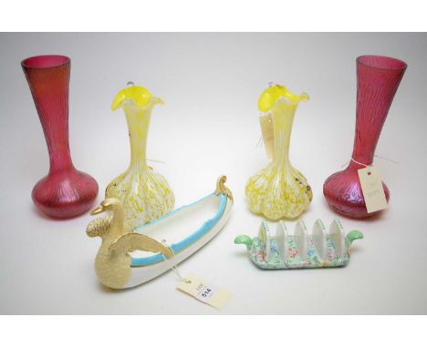 A Victorian boat-shaped vase of swan design, with registered diamond mark to base, 26cms long; together with a pair of irides
