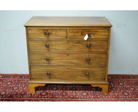 A 19th Century mahogany chest of drawers, the rectangular top above an arrangement of two short and three long graduated draw