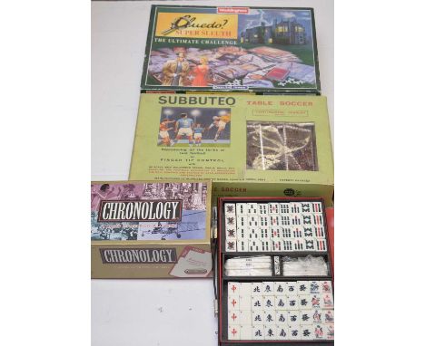 A quantity of games including Chronology, Waddingtons Cluedo, Super Sleuth, a cased Mahjong set and a Subbuteo table soccer s