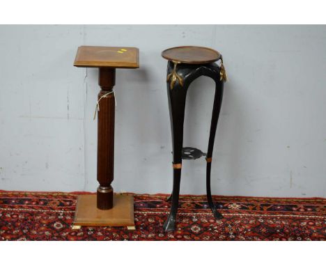 Two jardiniere stands, one with square moulded top above a central reeded column, raised on a rectangular base with brass bra