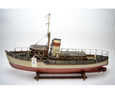 A scratch built ship model, of a propel driven steamer, fitted with electric motor, on stained wooden stand (not checked to b