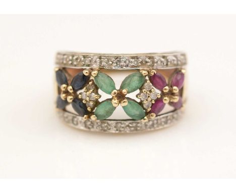 A gem-set dress ring, set with four marquise-shaped facet-cut sapphires, emeralds, and rubies surrounded by brilliant-cut dia