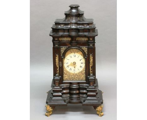 19TH CENTURY EBONISED AND GILT METAL MOUNTED BRACKET CLOCK, the 7" enamelled dial surrounded by chinoiserie gilt metal blind 