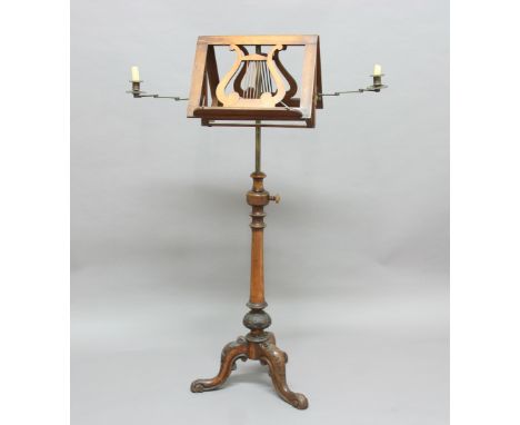 VICTORIAN MAHOGANY DOUBLE SIDED MUSIC STAND, the lyre shaped rests with a pair of brass candleholders on a brass telescopic s