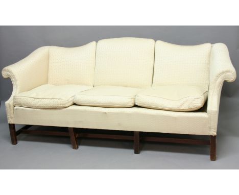 GEORGE III STYLE SOFA, with serpentine back, scrolled arms and mahogany reeded legs, in cream silk upholstery, height 80cm, l