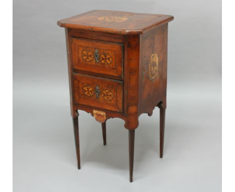 ITALIAN WALNUT AND INLAID COMMODE, late 18th century, the canted top inlaid with a crest above two inlaid drawers, height 88c
