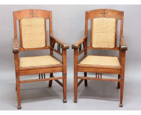 SET OF FOUR DUTCH COLONIAL TEAK AND INLAID ELBOW CHAIRS, early 20th century, with caned back and seat, ebony and mother of pe