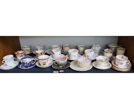 A Collection of 19th Century and Later Moustache Cups and Saucers, includes Staffordshire examples from Royal Albert, Fenton,