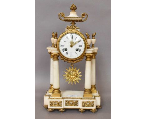 An Alabaster and Gilt Metal Striking Portico Clock, circa 1910, the twin-barrel movement striking on a bell, the movement bac