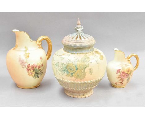 Royal Worcester Blush Ivory, comprising a vase and cover shape no.1286 with puce backstamp, 20cm high and two floral painted 