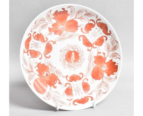 A 19th century Chinese export Plate, decorated with blossoms in red, square seal mark, 23cm diameter