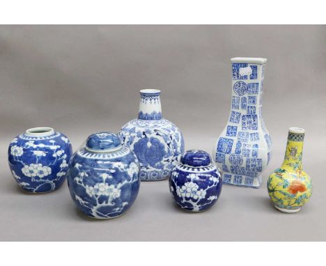 A Chinese Yellow Ground Bottle Vase, Kangxi mark but later, together with Chinese blue and white vases (one tray)Yellow bottl